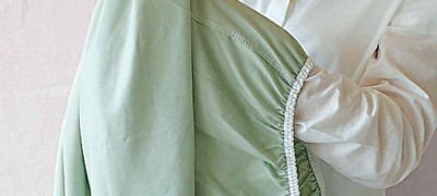 Comment plier un drap avec un élastique