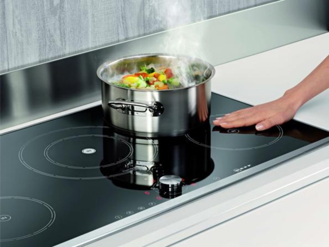 hand on induction hob