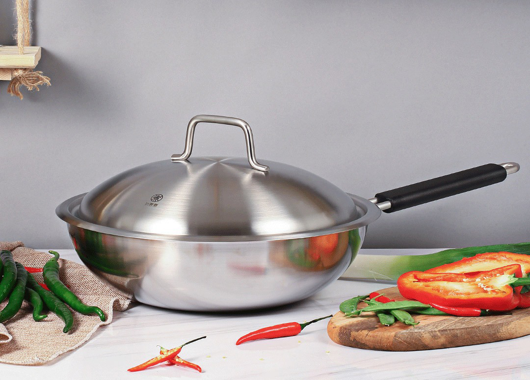 poêle wok en acier inoxydable
