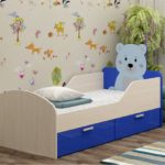 Camas para niños con parachoques de diseño fotográfico de 3 años.