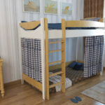 cama alta no apartamento