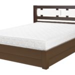 lit élévateur avec matelas blanc