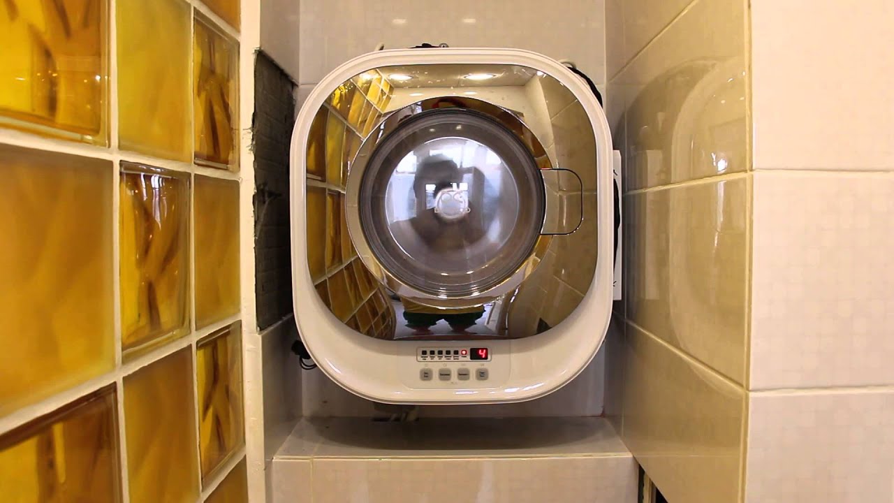 máquina de lavar parede no banheiro