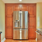 cabinet for the refrigerator on the sides of the tree