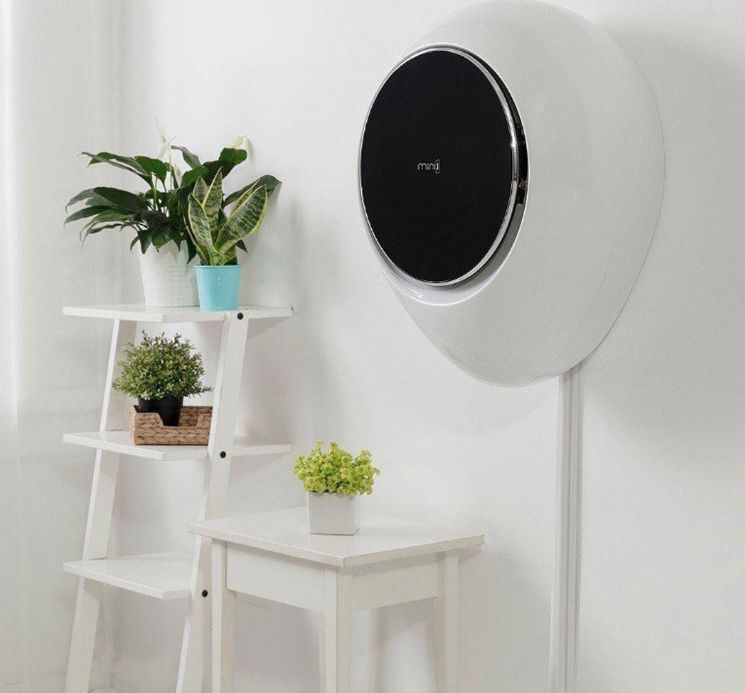 máquina de lavar roupa Xiaomi MiniJ branca montada na parede