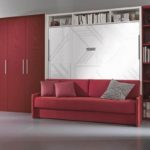 convertible bed in a red wardrobe