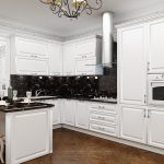white kitchen set with chandelier
