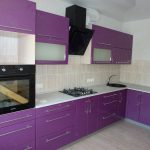 purple kitchen set with black microwave