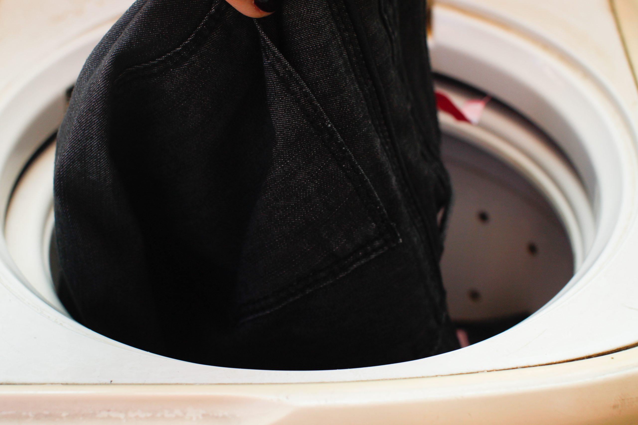 veste dans la machine à laver