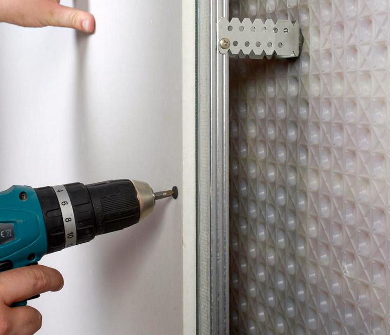 ยึด drywall เข้ากับผนัง