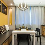 cocina de 9 metros cuadrados con un sofá vistas fotográficas