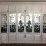 sliding wardrobe with facet mirror photo