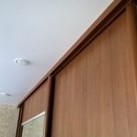 Schiebegarderobe mit Spanndecke Foto