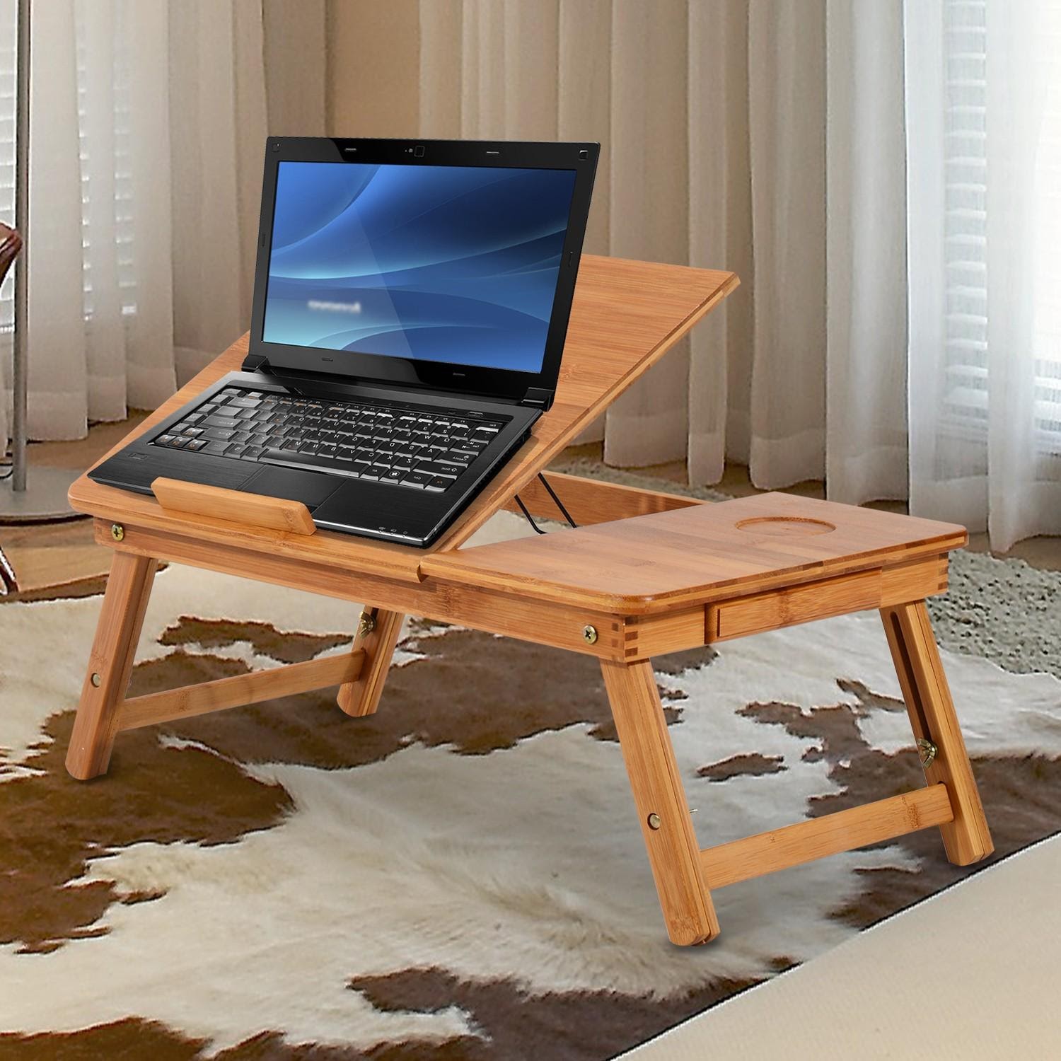 foto plegable de la mesa del ordenador portátil