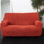 couverture euro sur le canapé corail