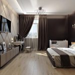 chambre rectangulaire avec des meubles sombres
