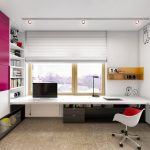 table le long de la fenêtre dans la pépinière avec un moniteur