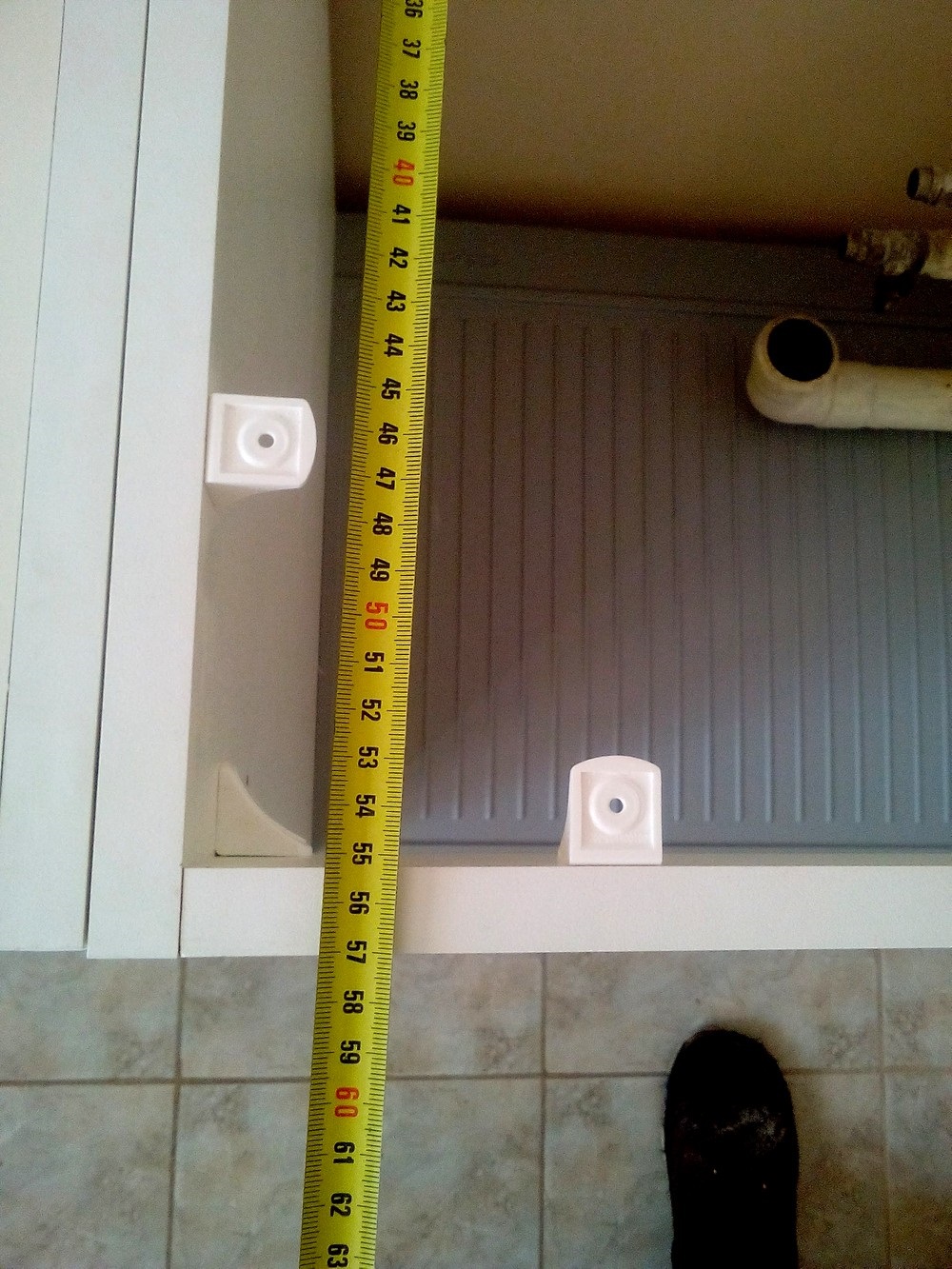 mesures de l'espace sous le trottoir