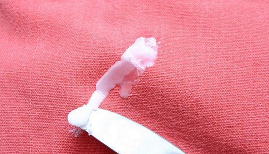 como remover cera de tecido
