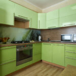 green kitchen with brown