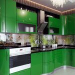 green kitchen with black