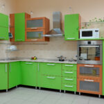 green kitchen with beige