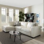 canapé en cuir blanc avec table ovale