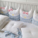 parachoques para la cama con lazos