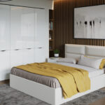 mobili bianchi in camera da letto con biancheria colorata