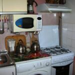 kitchen with suspended microwave