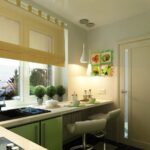 small kitchen with a green cabinet