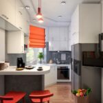 small kitchen with orange curtains