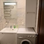 Schrank über der Waschmaschine Ansichten