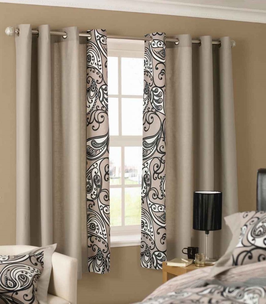 beige curtains in the bedroom with a lamp