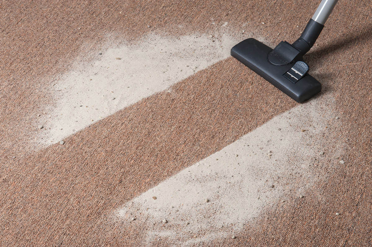 passer l'aspirateur sur un tapis