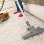 passer l'aspirateur sur un tapis