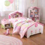 bed in a children's interior for a girl