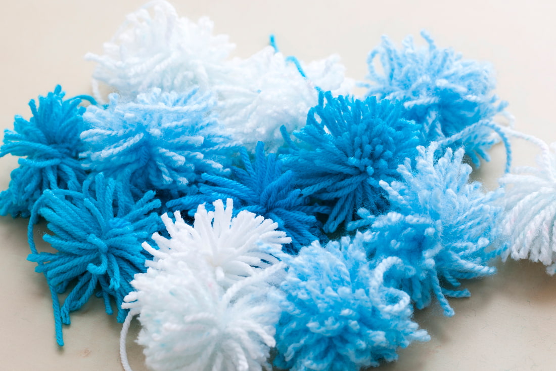 conception de tapis à pompons