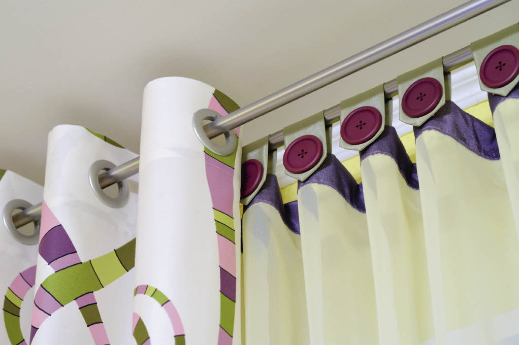 fijación de cortinas a la cornisa