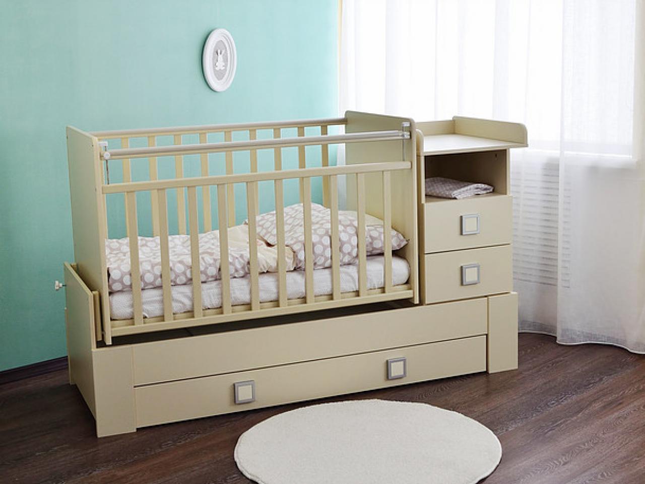 bed with a movable side