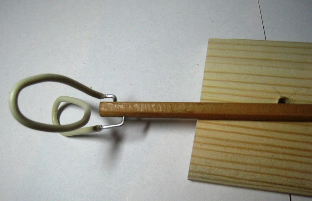 support pour selle de poupée