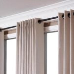 formas de unir cortinas a la cornisa de una foto interior