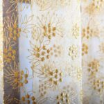 tulle avec broderie fleurs dorées