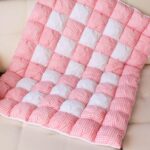 white and pink blanket bonbon