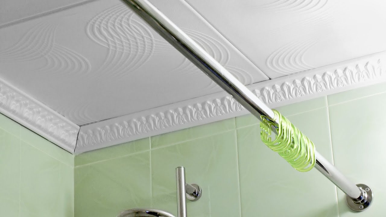 comment accrocher un rideau dans la salle de bain